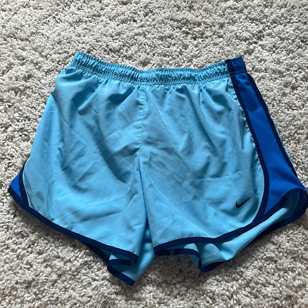Light blue Nike running shorts